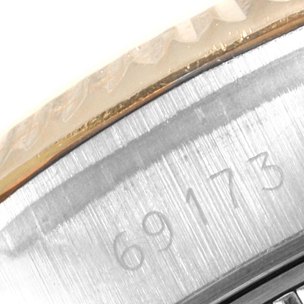This close-up shows the model number "69173" engraved on the case or bezel of the Rolex Datejust 69173 Women's Stainless Steel Champagne Dial 69173 Women's Stainless Steel Champagne Dial watch.