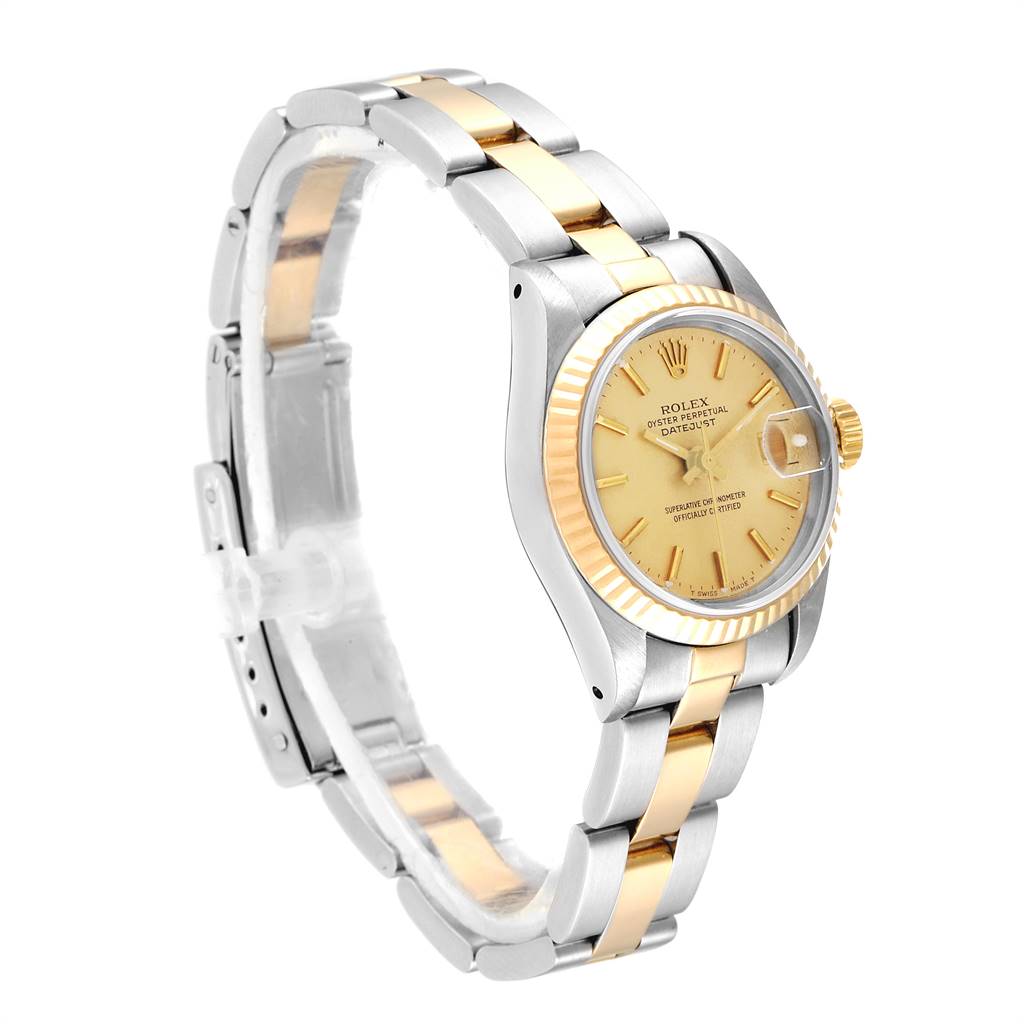 The image shows a Rolex Datejust 69173 Women's Stainless Steel Champagne Dial 69173 Women's Stainless Steel Champagne Dial watch at a three-quarter angle, showcasing its face, bezel, and two-tone bracelet.