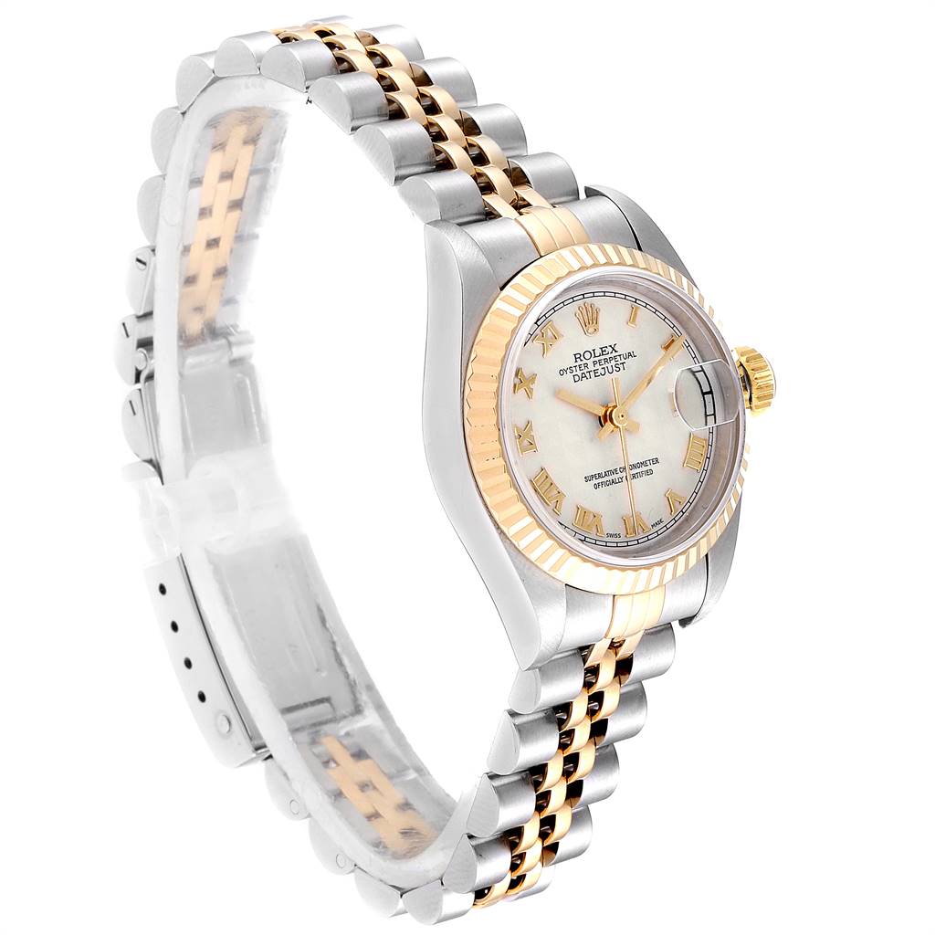 The Rolex Datejust 69173 Women's Stainless Steel Beige Dial 69173 Women's Stainless Steel Beige Dial watch is shown at an angled side view, highlighting its bracelet, dial, crown, and fluted bezel.
