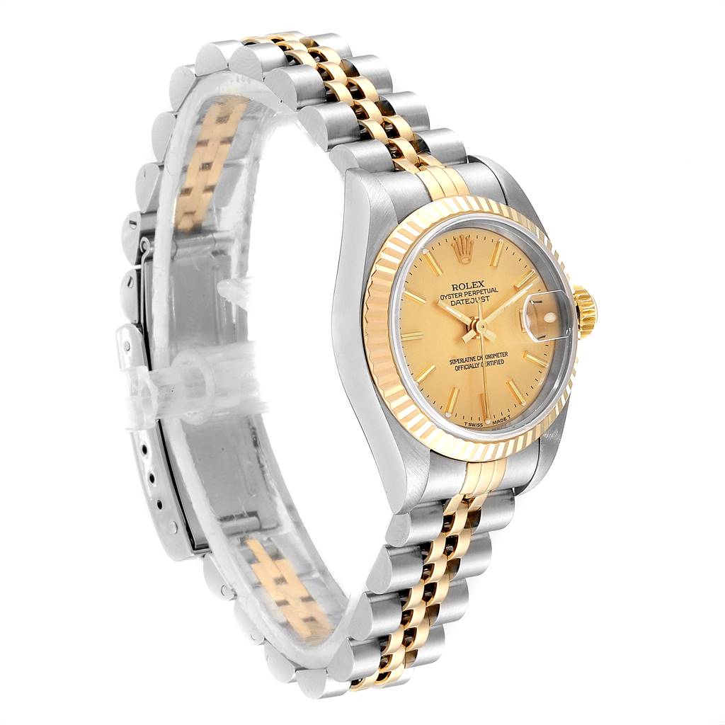 This Rolex Datejust 69173 Women's Steel and Gold (two tone) Champagne Dial 69173 Women's Steel and Gold (two tone) Champagne Dial watch is shown at a three-quarter angle, highlighting the face, bezel, and two-tone bracelet.