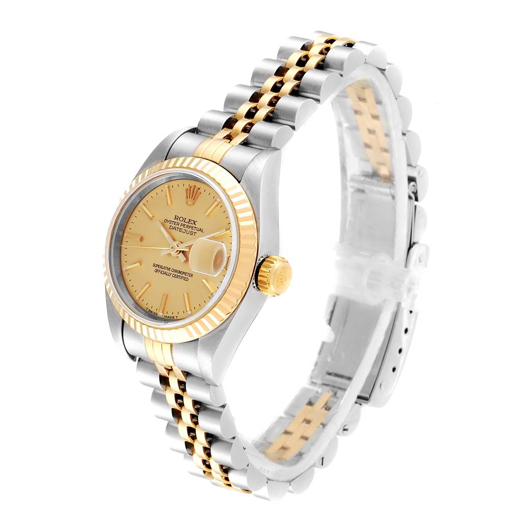 This Rolex Datejust 69173 Women's Steel and Gold (two tone) Champagne Dial 69173 Women's Steel and Gold (two tone) Champagne Dial watch is shown at a slight side angle, displaying its dial, bezel, crown, and two-tone bracelet.