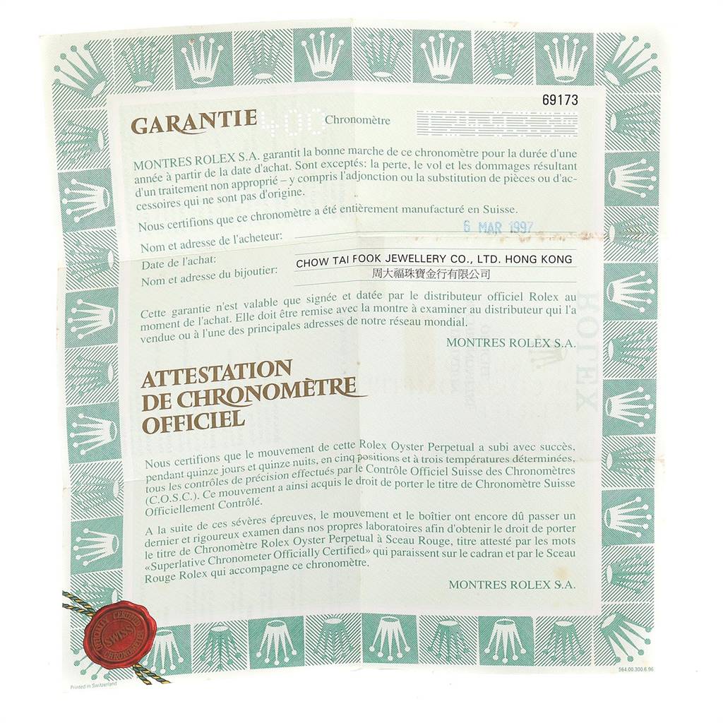 This image shows a Rolex warranty card for the Datejust model, including purchase details and official certification.