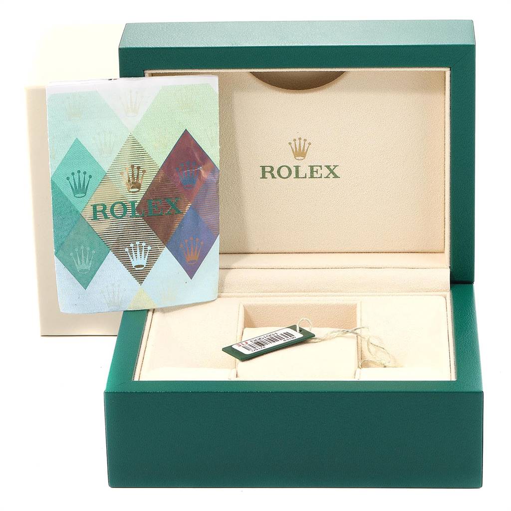 The image shows an open Rolex Datejust 179174 Women's Stainless Steel Blue Dial 179174 Women's Stainless Steel Blue Dial watch box with a certificate and a tag inside.
