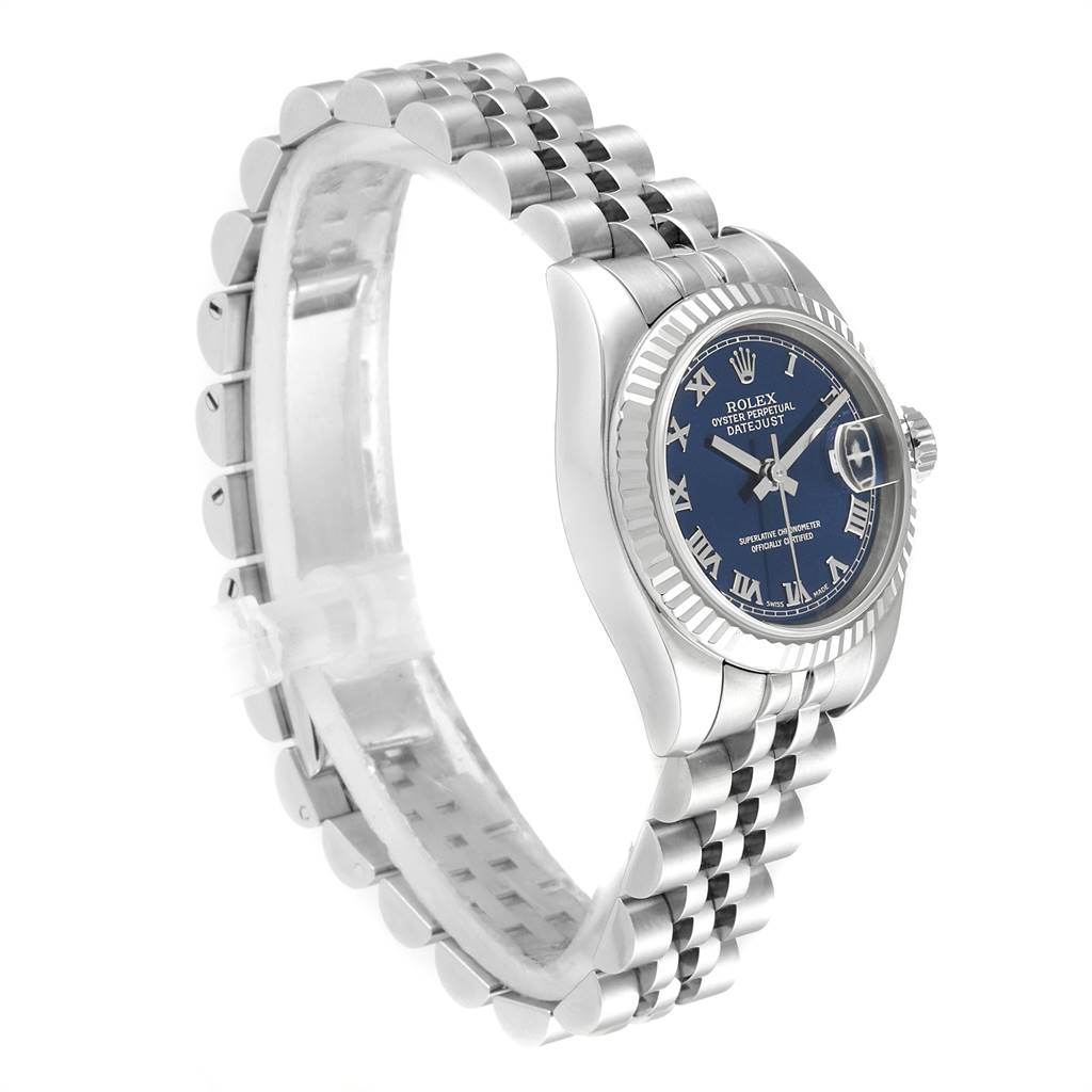 The image shows a Rolex Datejust 179174 Women's Stainless Steel Blue Dial 179174 Women's Stainless Steel Blue Dial watch at a three-quarter angle, highlighting the face, bezel, and bracelet.