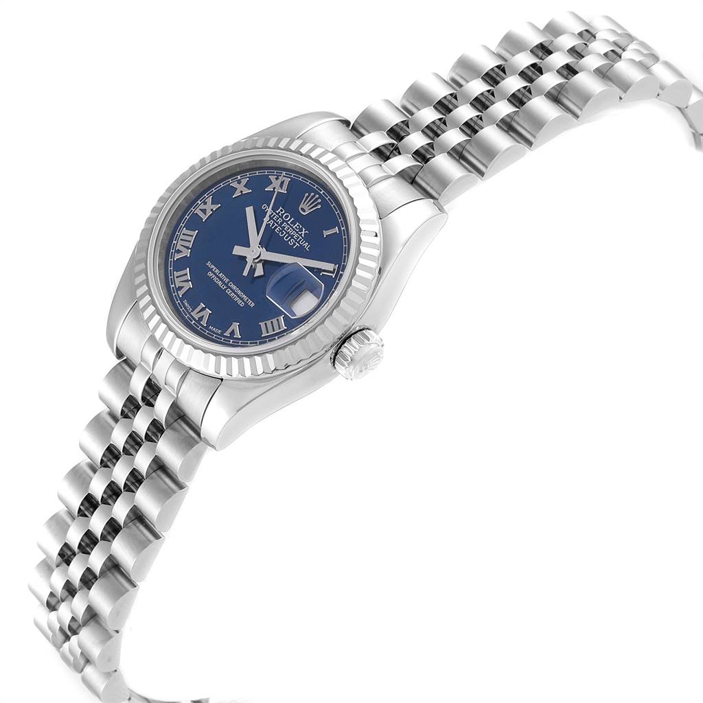 This image shows a side angle of a Rolex Datejust 179174 Women's Stainless Steel Blue Dial 179174 Women's Stainless Steel Blue Dial watch, highlighting its blue dial, fluted bezel, and Jubilee bracelet.