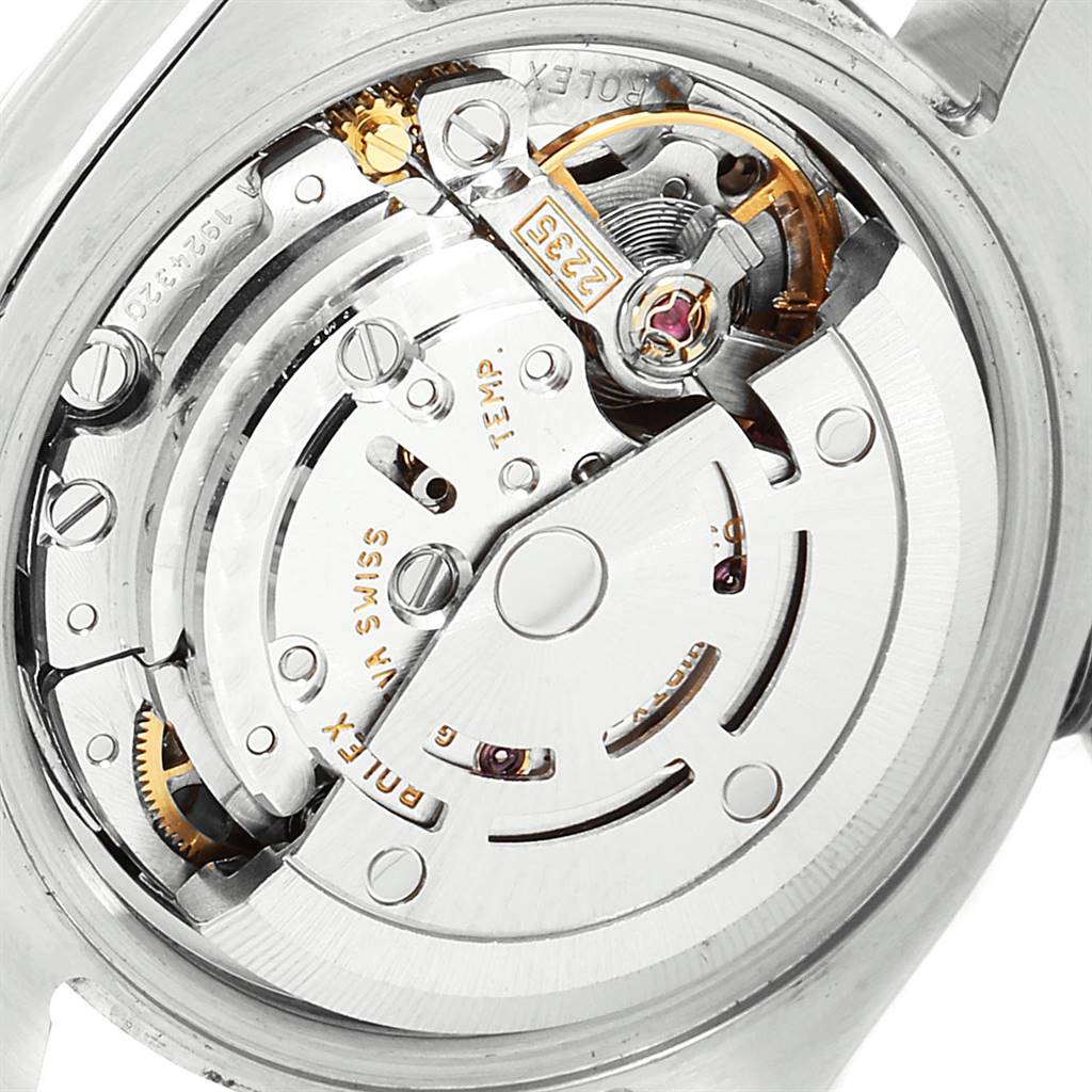 The image shows the intricate inner mechanical movements and parts of a Rolex Datejust 179174 Women's Stainless Steel Blue Dial 179174 Women's Stainless Steel Blue Dial watch viewed from the back.