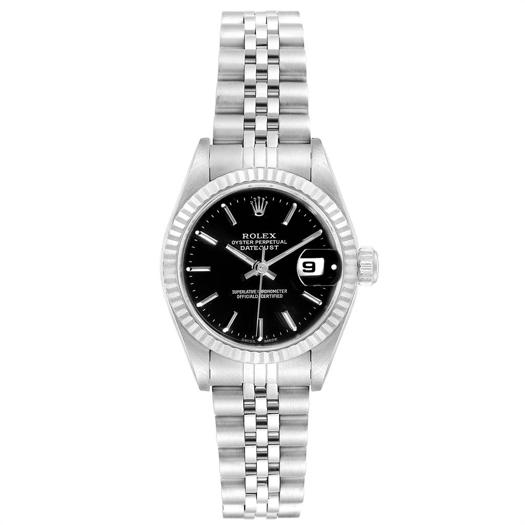 The image shows a Rolex Datejust 79174 Women's Stainless Steel Black Dial 79174 Women's Stainless Steel Black Dial watch from a top-down view, highlighting its black dial, fluted bezel, and Jubilee bracelet.