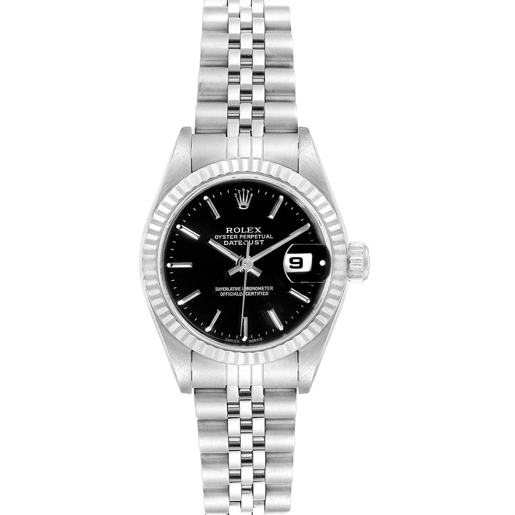 The image shows a Rolex Datejust 79174 Women's Stainless Steel Black Dial 79174 Women's Stainless Steel Black Dial watch from a front angle, highlighting its black dial, fluted bezel, and Jubilee bracelet.