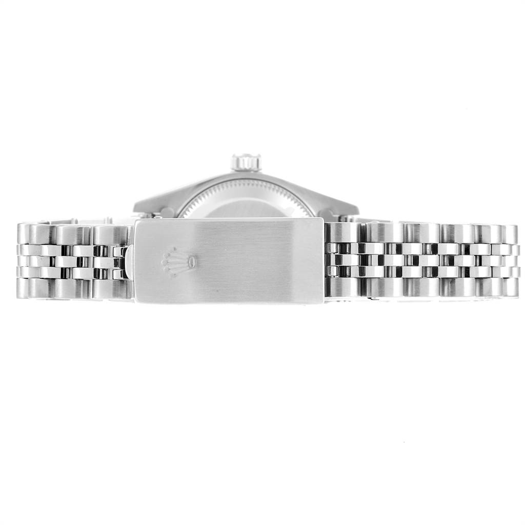 The image shows the clasp and part of the bracelet of a Rolex Datejust 79174 Women
s Stainless Steel Black Dial 79174 Women
s Stainless Steel Black Dial watch from the rear angle.