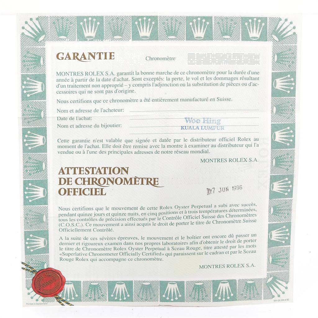 The image shows a guarantee and official chronometer certification for a Rolex Datejust 69173 Women's Stainless Steel Silver Dial 69173 Women's Stainless Steel Silver Dial model.