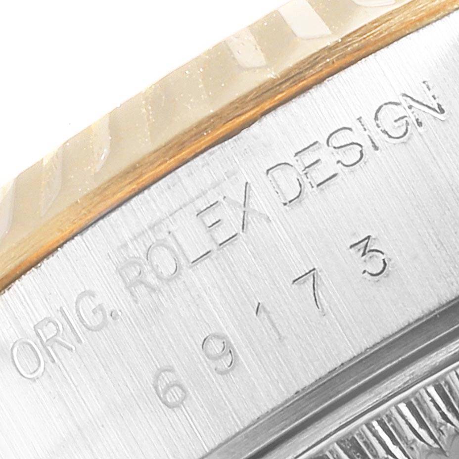 The image shows a close-up of the casing with engraving for a Rolex Datejust 69173 Women
s Stainless Steel Silver Dial 69173 Women
s Stainless Steel Silver Dial watch, highlighting the "Orig. Rolex Design" inscription.