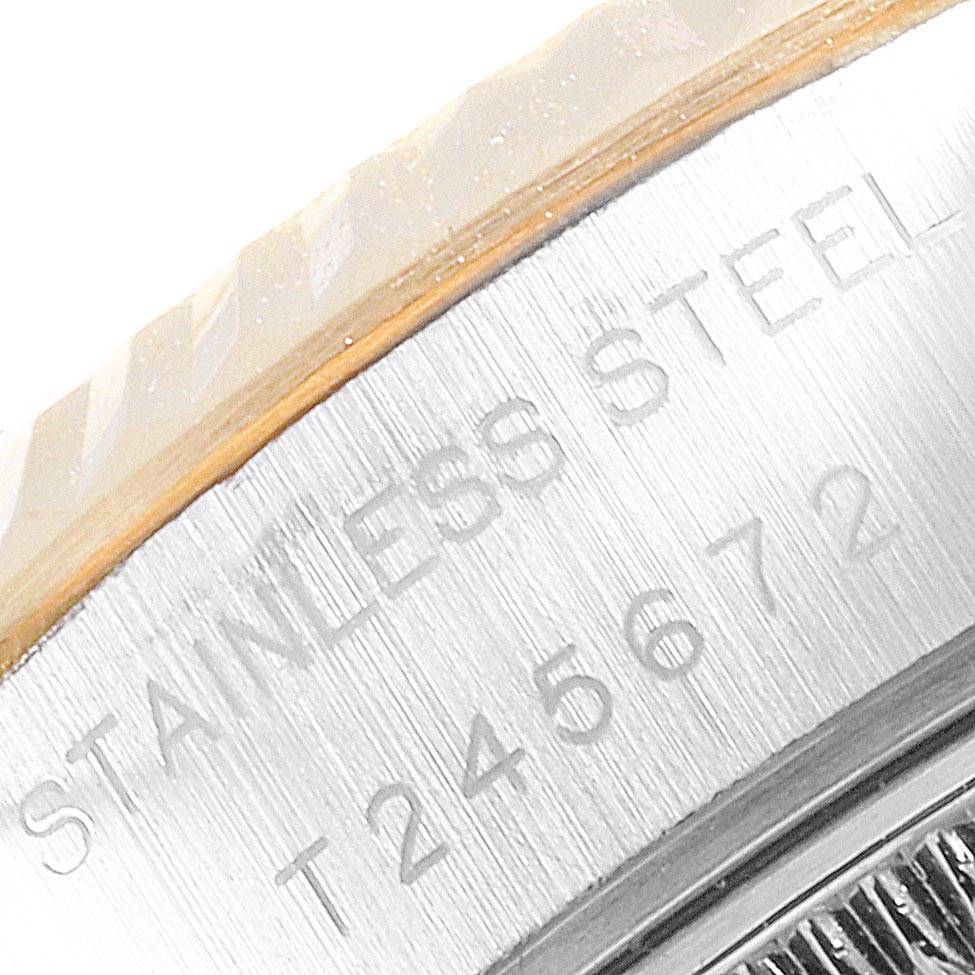The image shows a close-up of the stainless steel engraving on the side of a Rolex Datejust 69173 Women
s Stainless Steel Silver Dial 69173 Women
s Stainless Steel Silver Dial watch case.