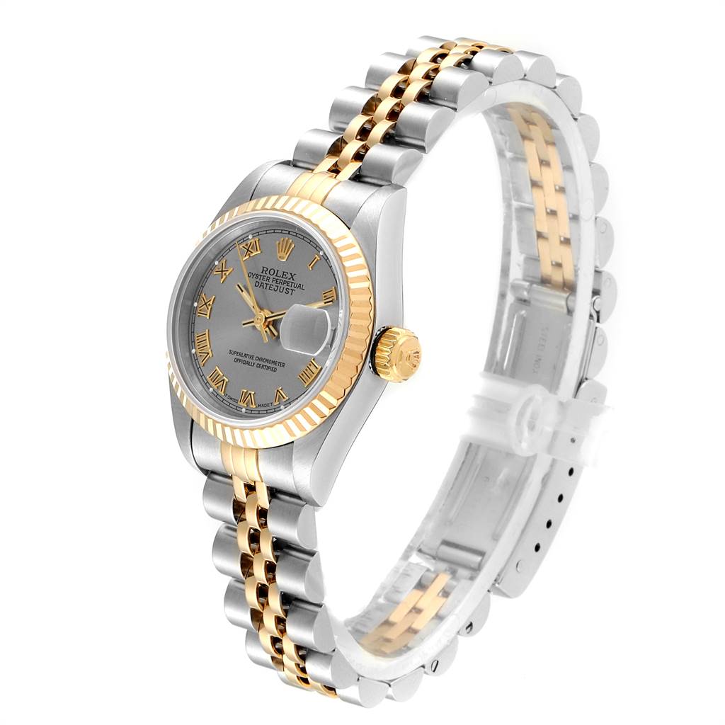 The Rolex Datejust 69173 Women
s Stainless Steel Silver Dial 69173 Women
s Stainless Steel Silver Dial watch is shown at an oblique angle, highlighting its two-tone bracelet, fluted bezel, and crown.