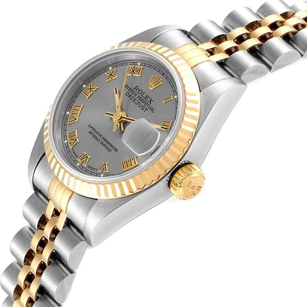 This image shows a side angle of a Rolex Datejust 69173 Women
s Stainless Steel Silver Dial 69173 Women
s Stainless Steel Silver Dial watch, highlighting its two-tone bracelet, fluted bezel, and crown.