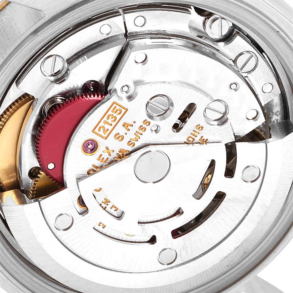 This image shows a close-up view of the Rolex Datejust 69173 Women
s Stainless Steel Beige Dial 69173 Women
s Stainless Steel Beige Dial movement mechanism from the back.