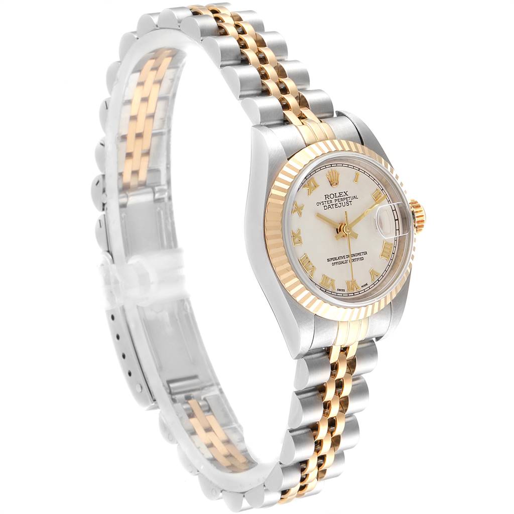 The Rolex Datejust 69173 Women
s Stainless Steel Beige Dial 69173 Women
s Stainless Steel Beige Dial watch is shown at an angle displaying its dial, bezel, case, and two-tone bracelet.