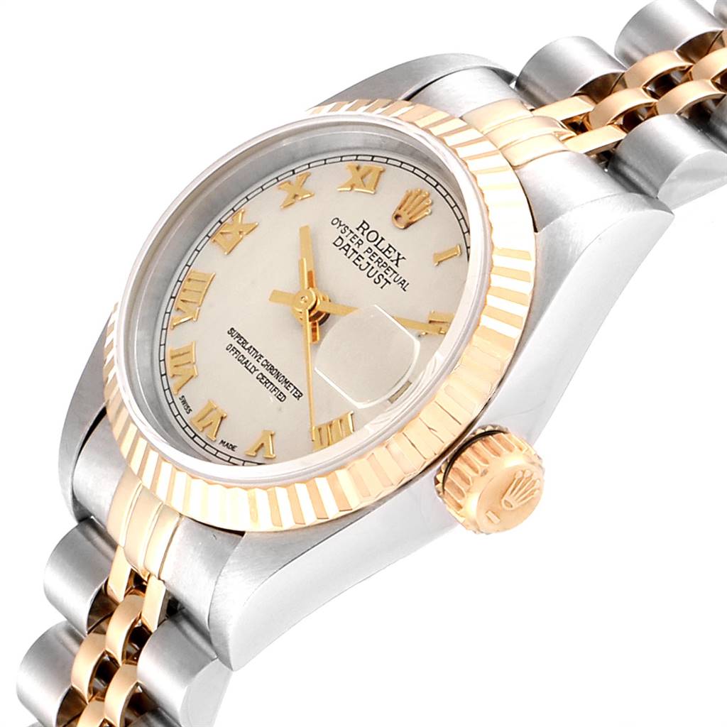 The image shows a close-up, angled view of a Rolex Datejust 69173 Women
s Stainless Steel Beige Dial 69173 Women
s Stainless Steel Beige Dial, featuring its dial, fluted bezel, crown, and part of the jubilee bracelet.