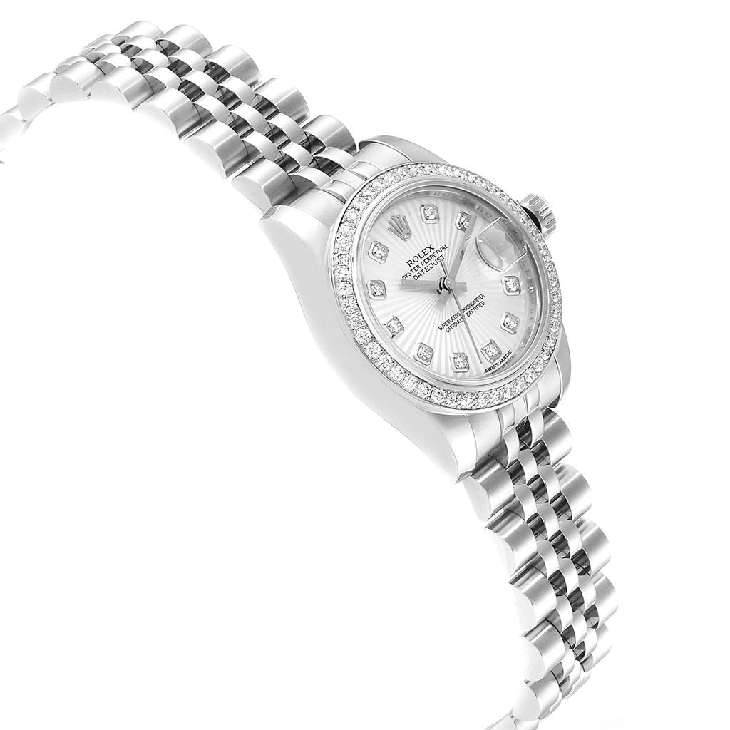 The image shows a Rolex Datejust 179384 Women's Stainless Steel Silver Dial 179384 Women's Stainless Steel Silver Dial watch tilted to display the dial, bezel, and Jubilee bracelet.
