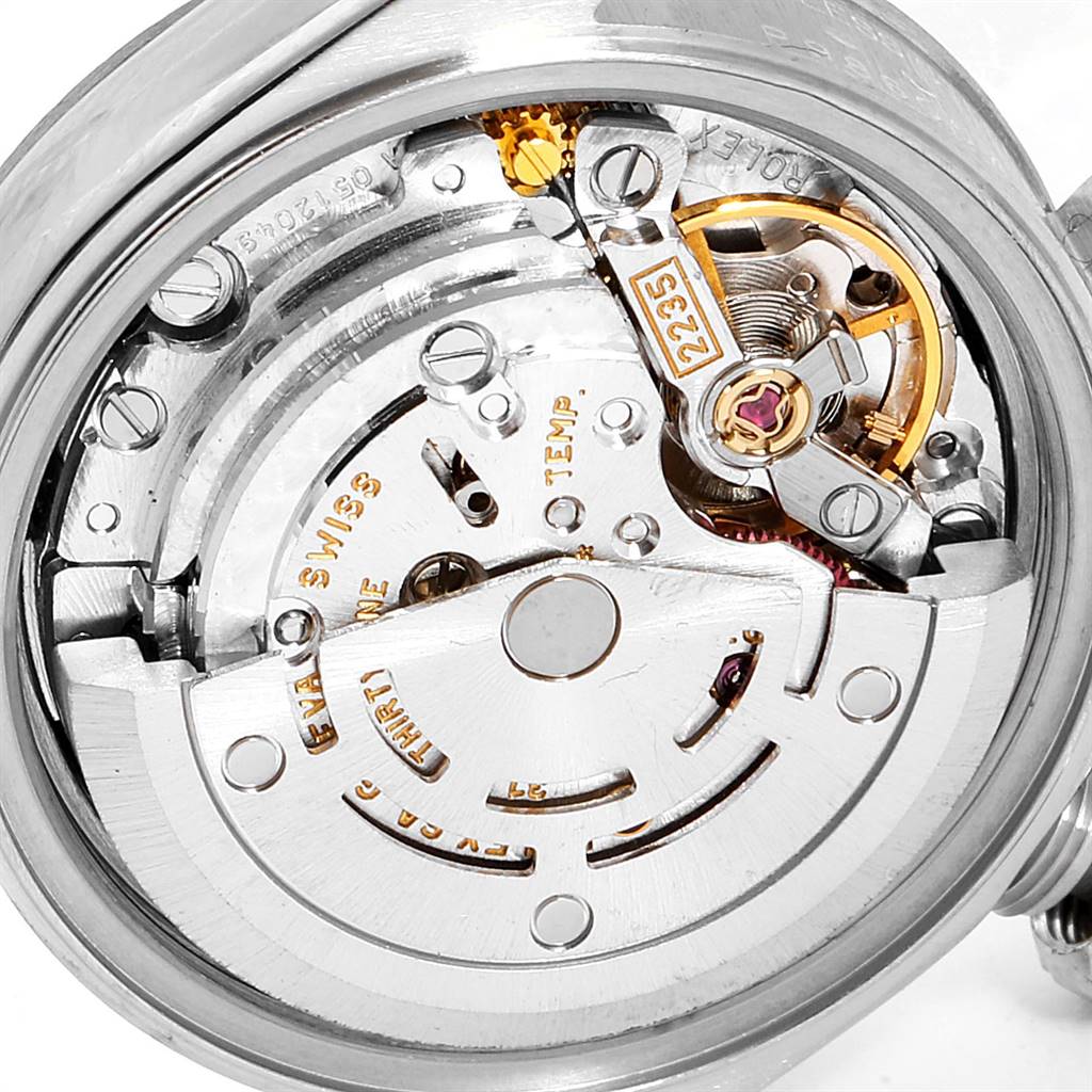 The image shows a close-up of the internal movement parts of a Rolex Datejust 79174 Women's Stainless Steel Pink Dial 79174 Women's Stainless Steel Pink Dial watch.