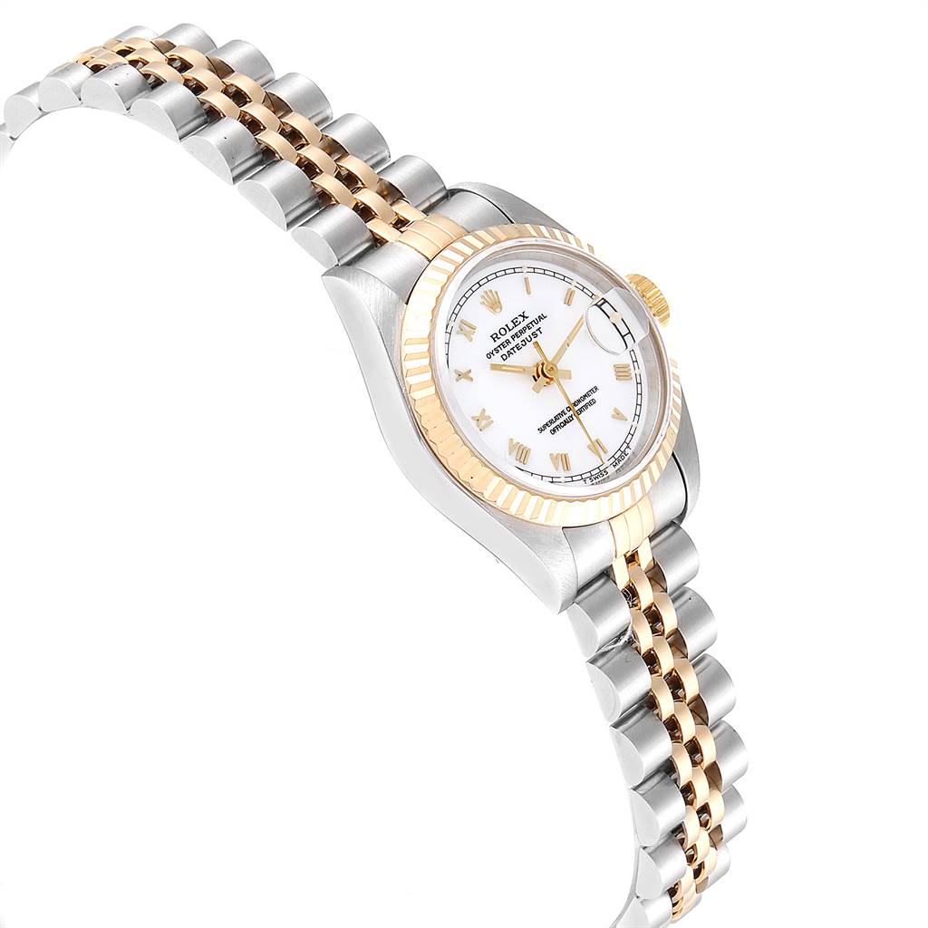 This image shows a side angle of the Rolex Datejust 69173 Women's Stainless Steel White Dial 69173 Women's Stainless Steel White Dial watch, highlighting its gold and silver bracelet and fluted bezel.