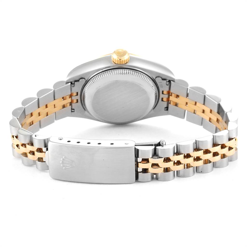 The image shows the back view of a Rolex Datejust 69173 Women's Stainless Steel White Dial 69173 Women's Stainless Steel White Dial watch, highlighting its case back and two-tone bracelet clasp.