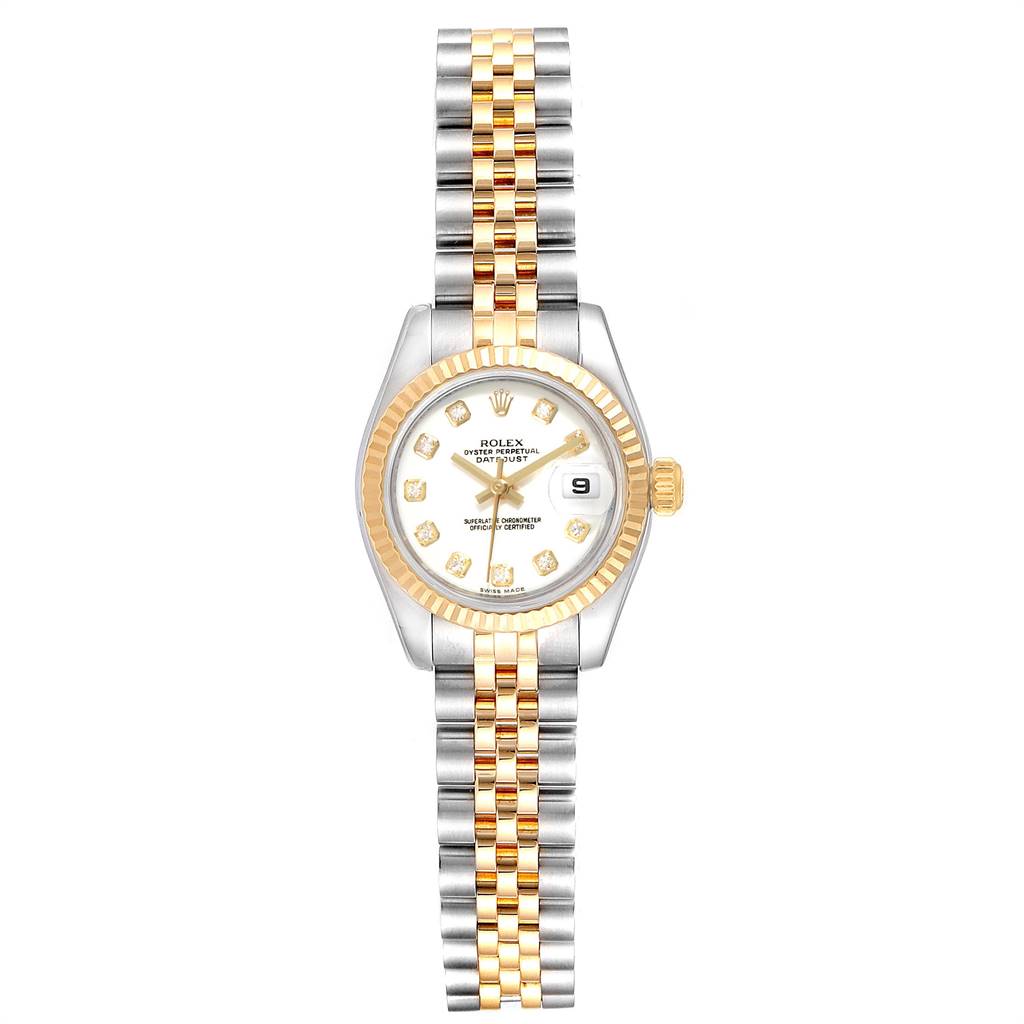 The image shows a Rolex Datejust 179173 Women's Steel and Gold (two tone) White Dial 179173 Women's Steel and Gold (two tone) White Dial watch from a top-down angle, featuring a two-tone bracelet and a fluted bezel with a date display.