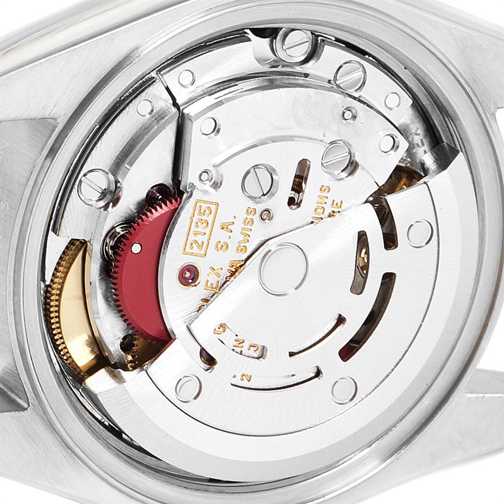 The image shows the movement mechanism of a Rolex Datejust 69173 Women's Steel and Gold (two tone) Champagne Dial 69173 Women's Steel and Gold (two tone) Champagne Dial watch from the back angle, highlighting the intricate internal components.