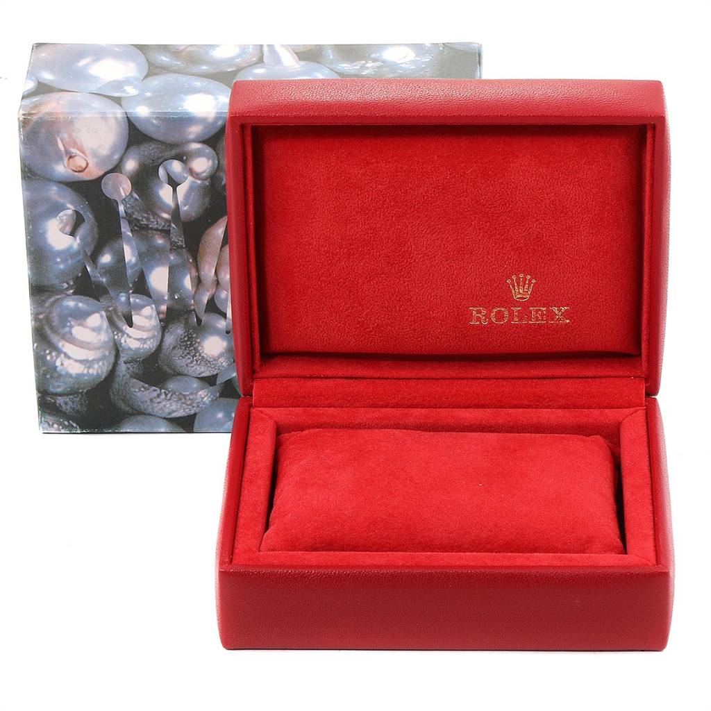 The image shows an open red Rolex Datejust 69173 Women's Steel and Gold (two tone) Champagne Dial 69173 Women's Steel and Gold (two tone) Champagne Dial watch box without the watch, along with the outer packaging.