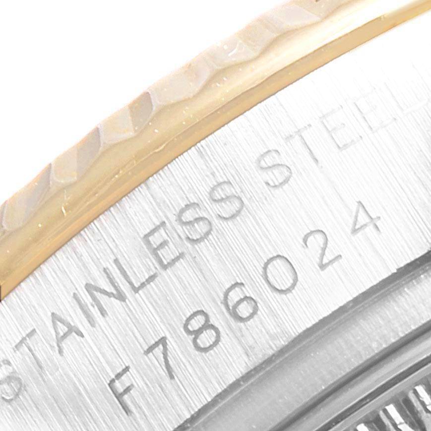 This close-up view of the Rolex Datejust 179173 Women's Steel and Gold (two tone) White Dial 179173 Women's Steel and Gold (two tone) White Dial watch shows a partial reference number and the "Stainless Steel" engraving on the case back.