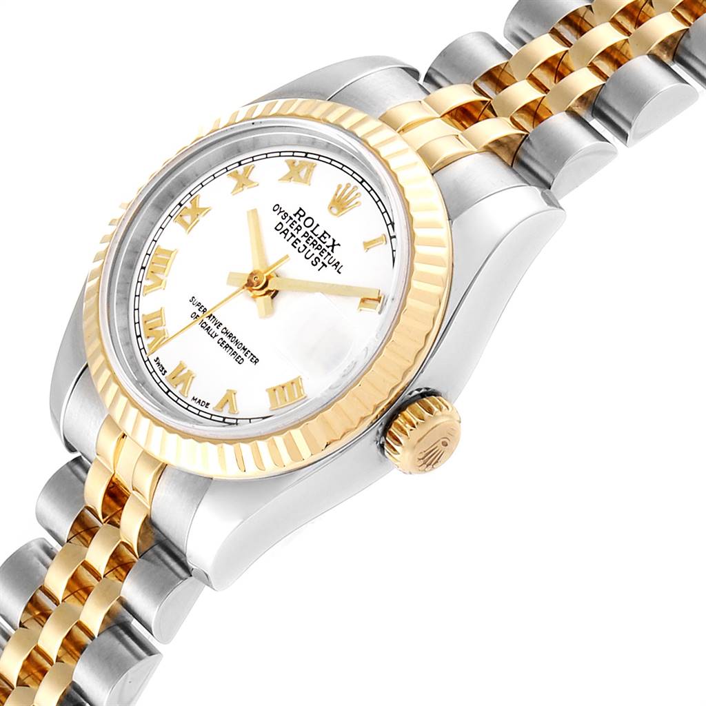 This image shows a Rolex Datejust 179173 Women's Steel and Gold (two tone) White Dial 179173 Women's Steel and Gold (two tone) White Dial watch at an angle highlighting the dial, bezel, crown, and part of the bracelet.