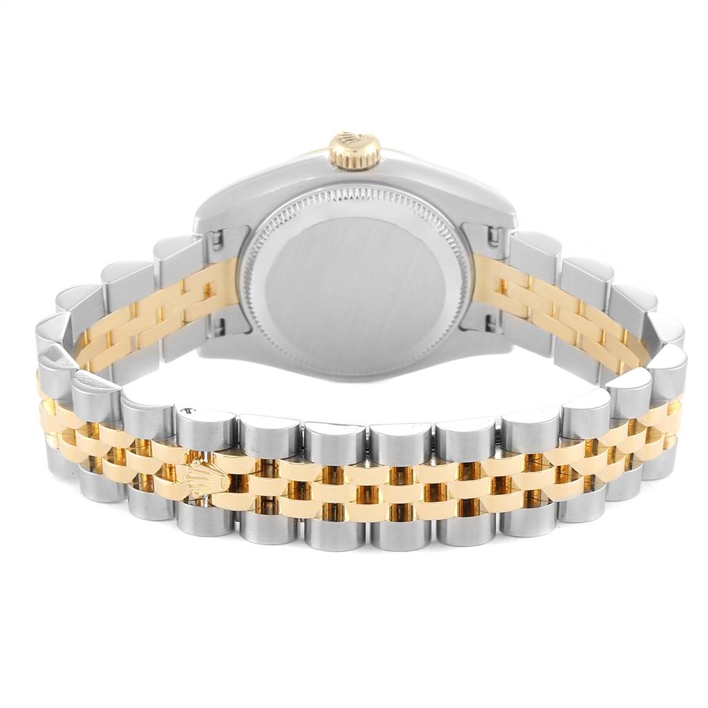 The image shows the back view of the Rolex Datejust 179173 Women's Steel and Gold (two tone) White Dial 179173 Women's Steel and Gold (two tone) White Dial watch, highlighting its two-tone gold and silver bracelet and closed case back.