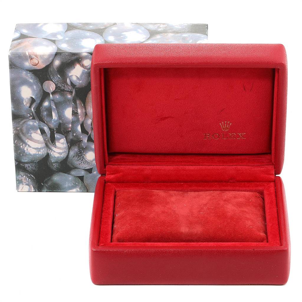 The image shows an open red velvet Rolex watch box for the Datejust model with "Rolex" branding inside.