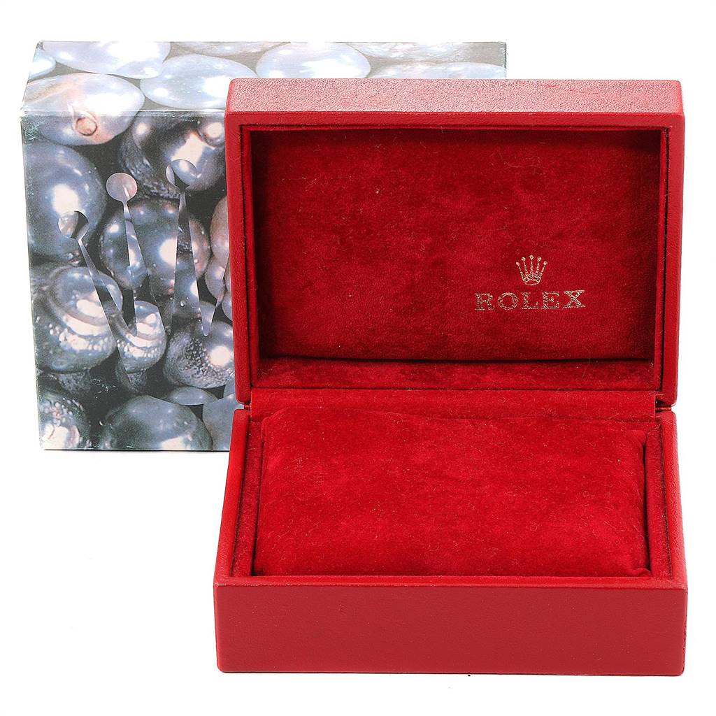This image shows a red velvet Rolex Datejust 69173 Women's Stainless Steel Silver Dial 69173 Women's Stainless Steel Silver Dial watch box with the Rolex logo inside.