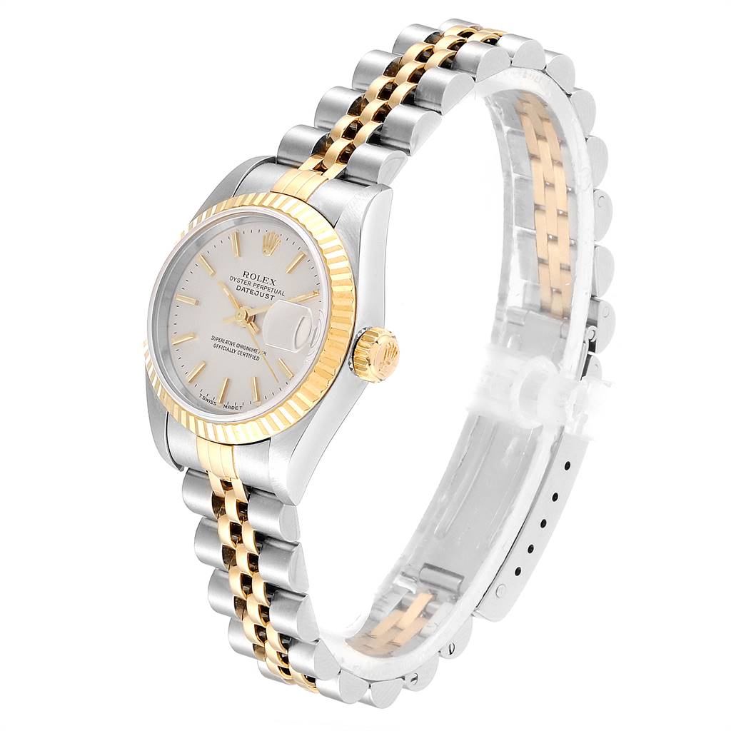 This image shows a side angle view of a Rolex Datejust 69173 Women's Stainless Steel Silver Dial 69173 Women's Stainless Steel Silver Dial watch, highlighting its two-tone bracelet, case, and fluted bezel.