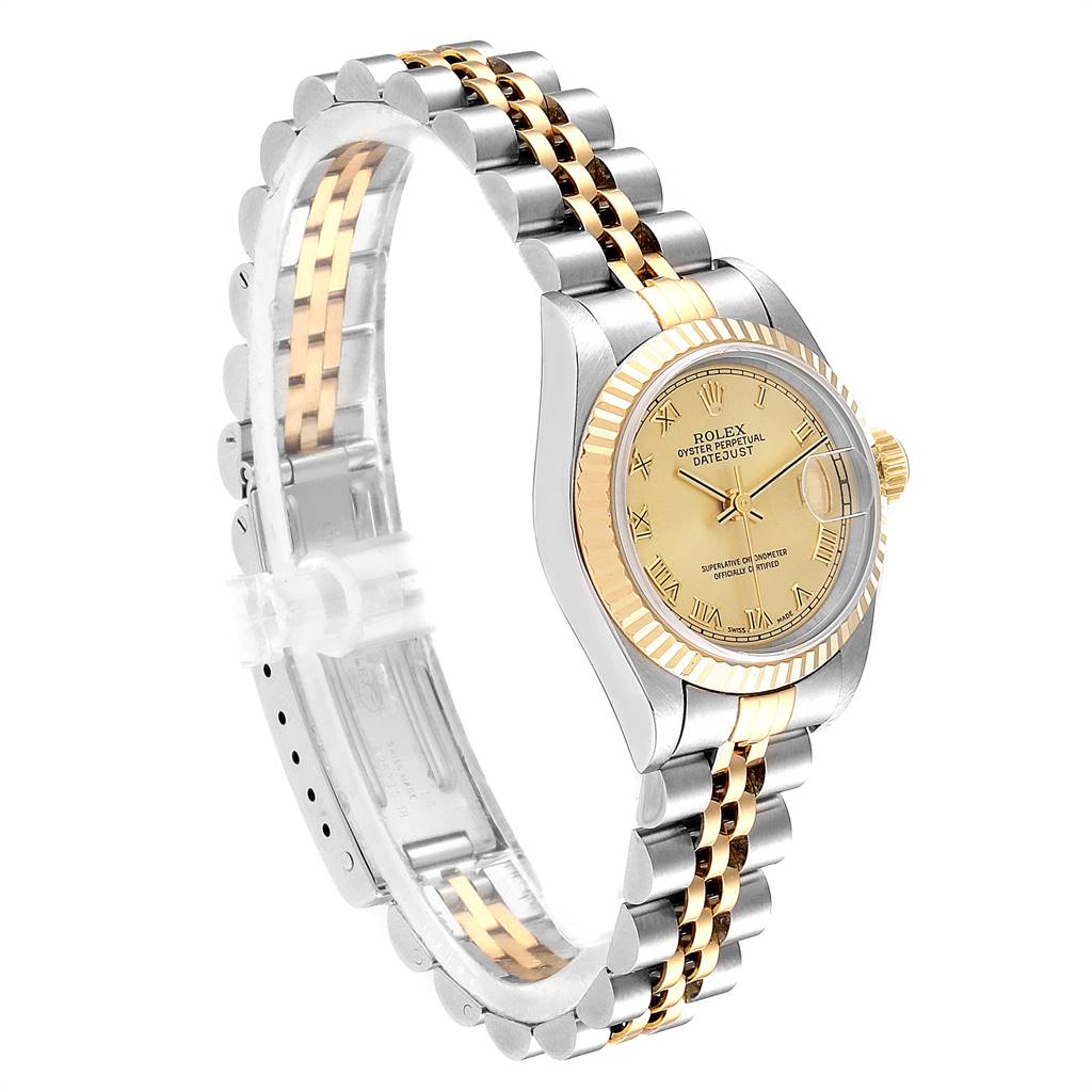 This image shows a Rolex Datejust 69173 Women's Stainless Steel Champagne Dial 69173 Women's Stainless Steel Champagne Dial watch from a side angle, highlighting its two-tone bracelet and fluted bezel.