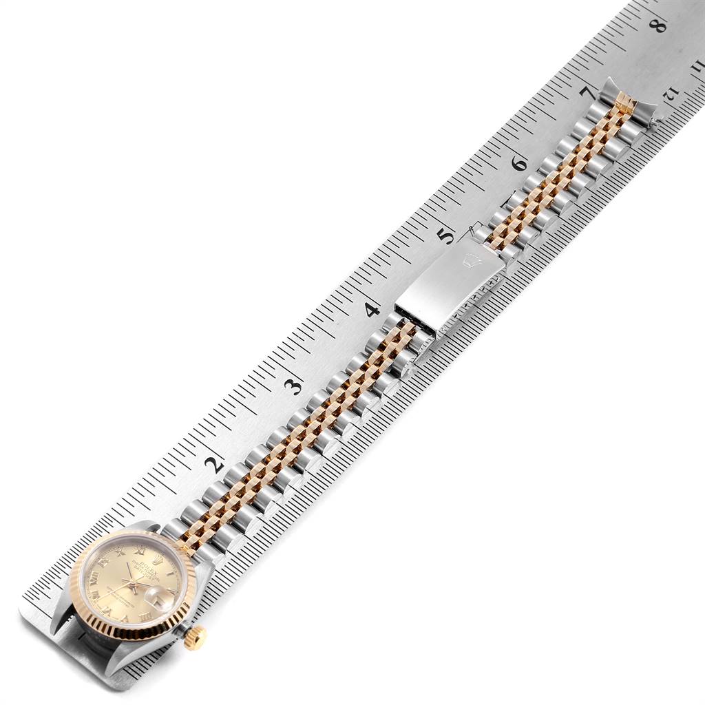 The Rolex Datejust 69173 Women's Stainless Steel Champagne Dial 69173 Women's Stainless Steel Champagne Dial watch is shown from a top-down angle, with the watch case, dial, and full bracelet visible.