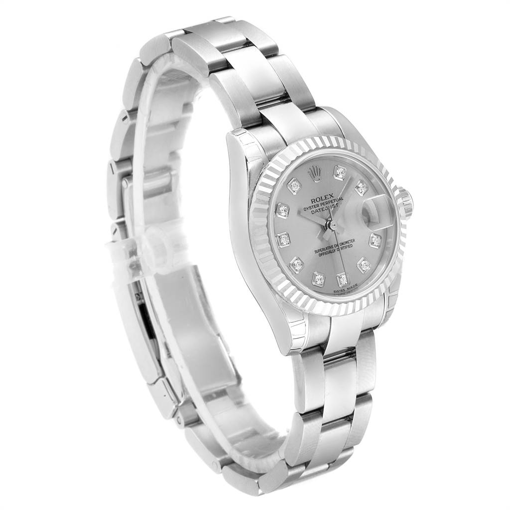 The Rolex Datejust 179174 Women
s Stainless Steel Silver Dial 179174 Women
s Stainless Steel Silver Dial watch is shown at an angle revealing the face, fluted bezel, and bracelet.