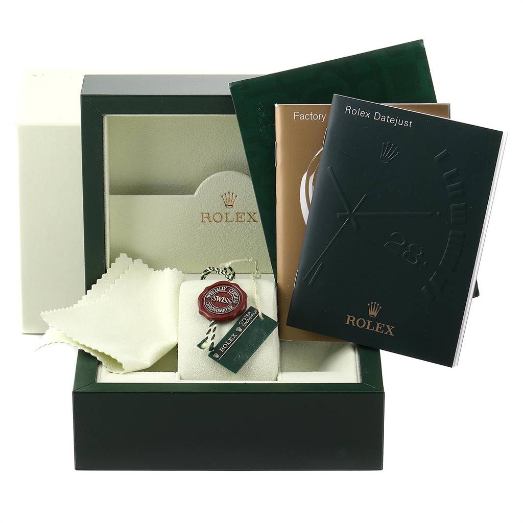 The image shows the Rolex Datejust 179174 Women
s Stainless Steel Black Dial 179174 Women
s Stainless Steel Black Dial watch box, manuals, tags, and a cleaning cloth from a front angle.