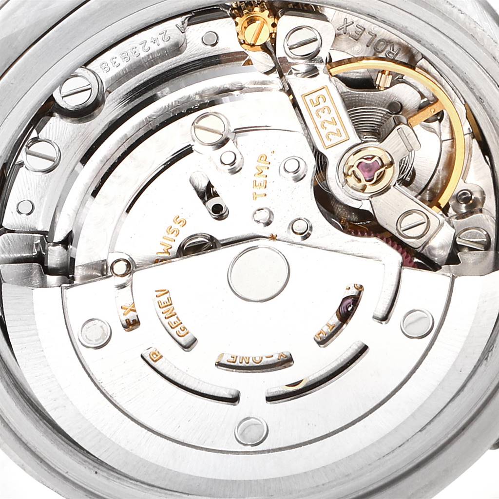 The image shows an internal view of the Rolex Datejust 179174 Women
s Stainless Steel Mother of Pearl Dial 179174 Women
s Stainless Steel Mother of Pearl Dial watch, focusing on its movement and mechanical components.
