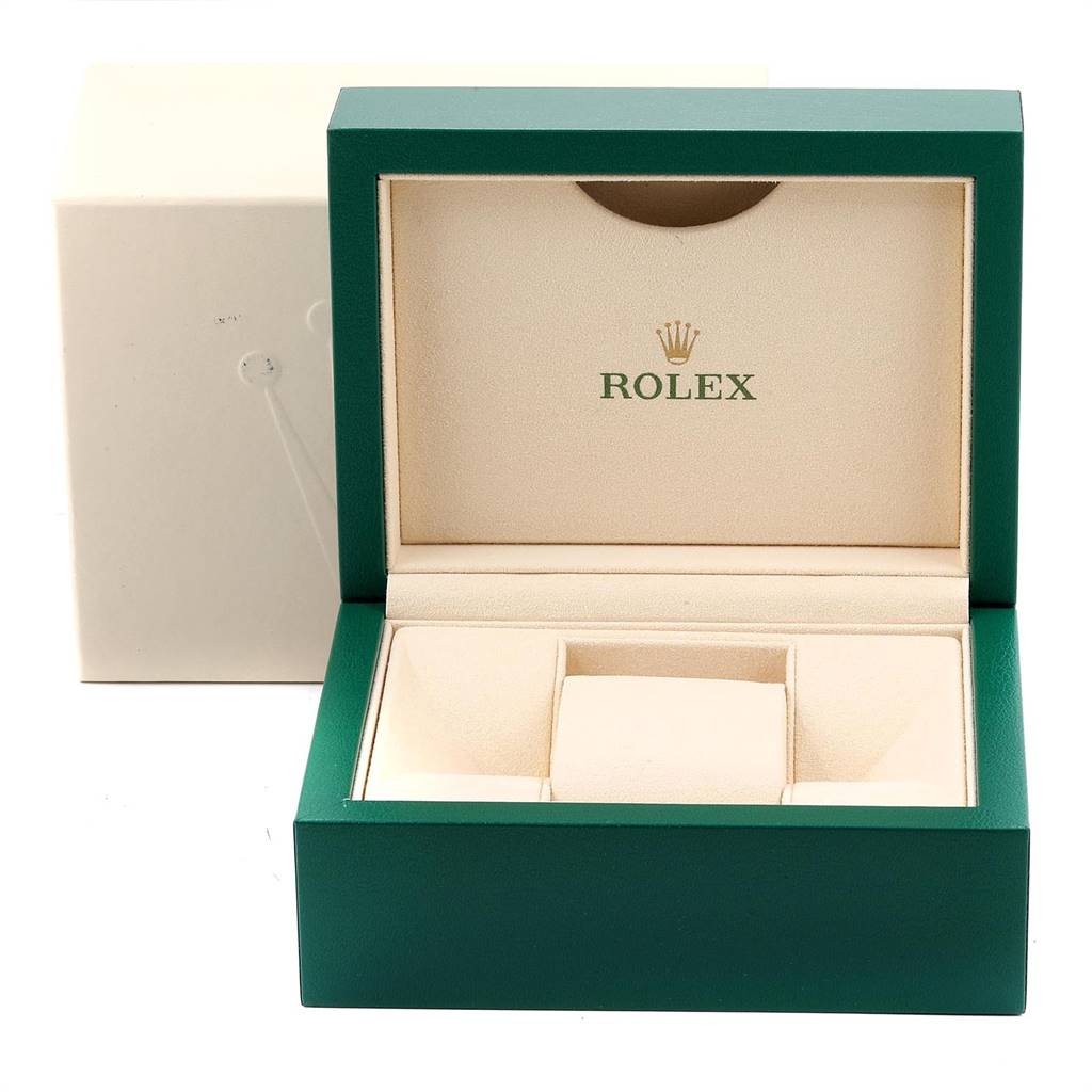 This image shows an open Rolex Datejust 179171 Women's Steel and Gold (two tone) Pink Dial 179171 Women's Steel and Gold (two tone) Pink Dial watch box, highlighting its interior and cushion for the watch.