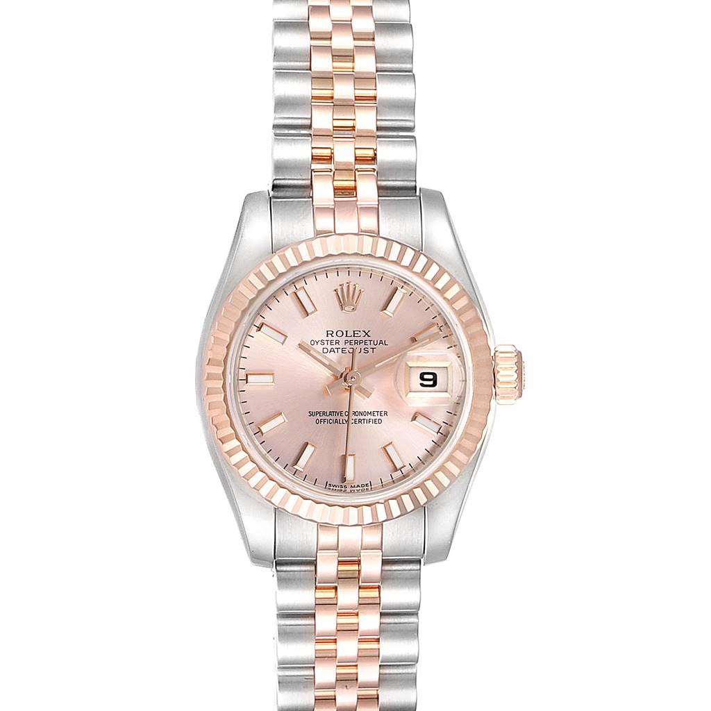 The Rolex Datejust 179171 Women's Steel and Gold (two tone) Pink Dial 179171 Women's Steel and Gold (two tone) Pink Dial watch is shown from a top-down angle, highlighting its two-tone bracelet, fluted bezel, and pink dial with date display.
