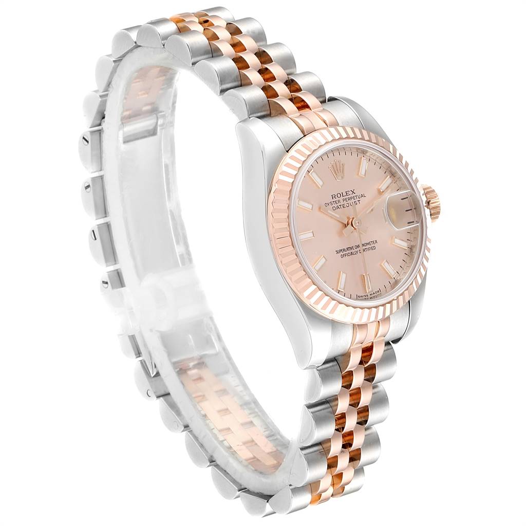 The Rolex Datejust 179171 Women's Steel and Gold (two tone) Pink Dial 179171 Women's Steel and Gold (two tone) Pink Dial watch is shown at an oblique angle, highlighting the two-tone bracelet, fluted bezel, and dial with date display.