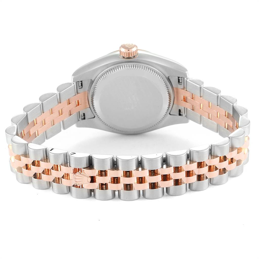 The Rolex Datejust 179171 Women's Steel and Gold (two tone) Pink Dial 179171 Women's Steel and Gold (two tone) Pink Dial watch is shown from the back, highlighting its two-tone metal bracelet and case back.