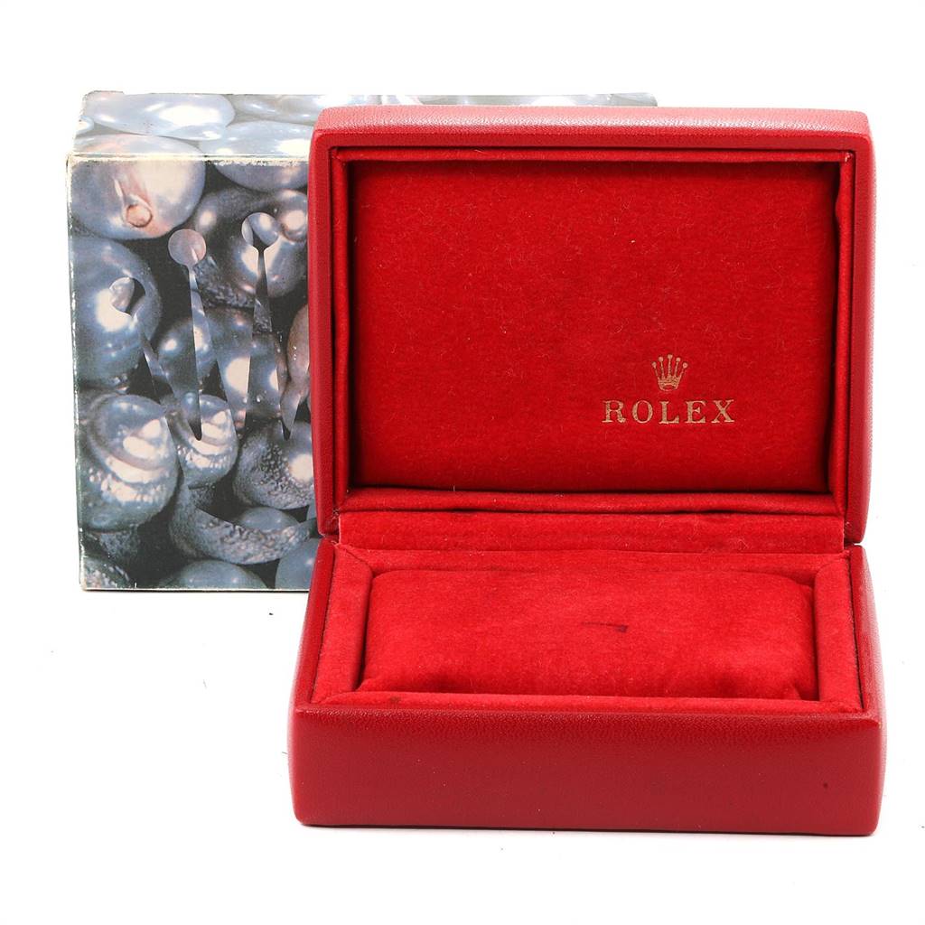 This image shows an empty red Rolex watch box for the Datejust model, with the interior and the Rolex logo visible.
