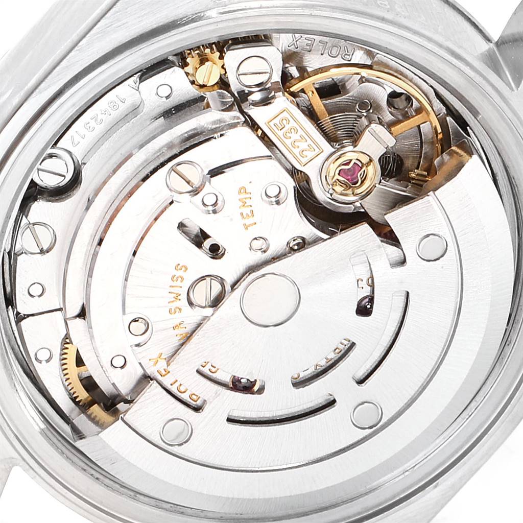 This image shows a close-up view of the movement mechanism inside the Rolex Datejust 79174 Women
s Stainless Steel Silver Dial 79174 Women
s Stainless Steel Silver Dial watch.