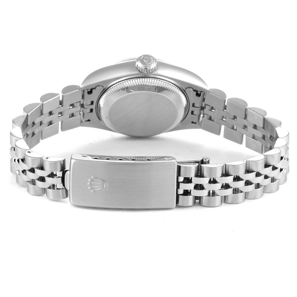 The image shows the backside of a Rolex Datejust 79174 Women
s Stainless Steel Silver Dial 79174 Women
s Stainless Steel Silver Dial watch, focusing on the case back, crown, and bracelet with the clasp visible.