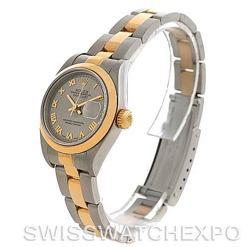 The image shows a Rolex Datejust 79163 Women's Steel and Gold (two tone) Silver Dial 79163 Women's Steel and Gold (two tone) Silver Dial watch at an angle showcasing the dial, bezel, and bracelet.