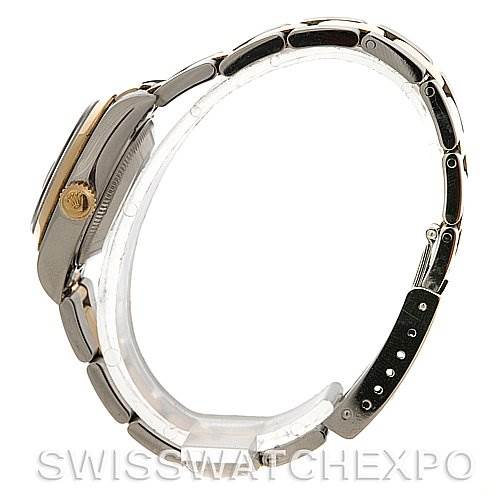 This image shows a side view of a Rolex Datejust 79163 Women's Steel and Gold (two tone) Silver Dial 79163 Women's Steel and Gold (two tone) Silver Dial watch, highlighting its bracelet, case, and crown.