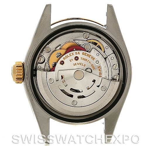 The image shows the open case back of a Rolex Datejust 79163 Women's Steel and Gold (two tone) Silver Dial 79163 Women's Steel and Gold (two tone) Silver Dial watch, revealing its movement and internal mechanics.