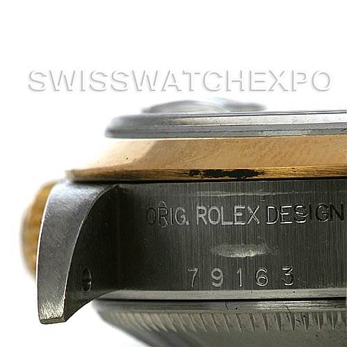 The image shows a close-up side view of a Rolex Datejust 79163 Women's Steel and Gold (two tone) Silver Dial 79163 Women's Steel and Gold (two tone) Silver Dial watch case, focusing on the bezel and engraved model number.